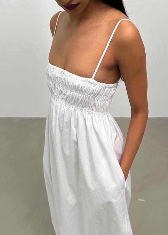 Solid color open back sleeveless suspender dress